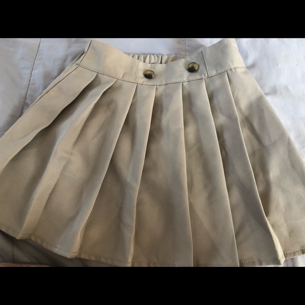 Beige pleated skort. Size 7